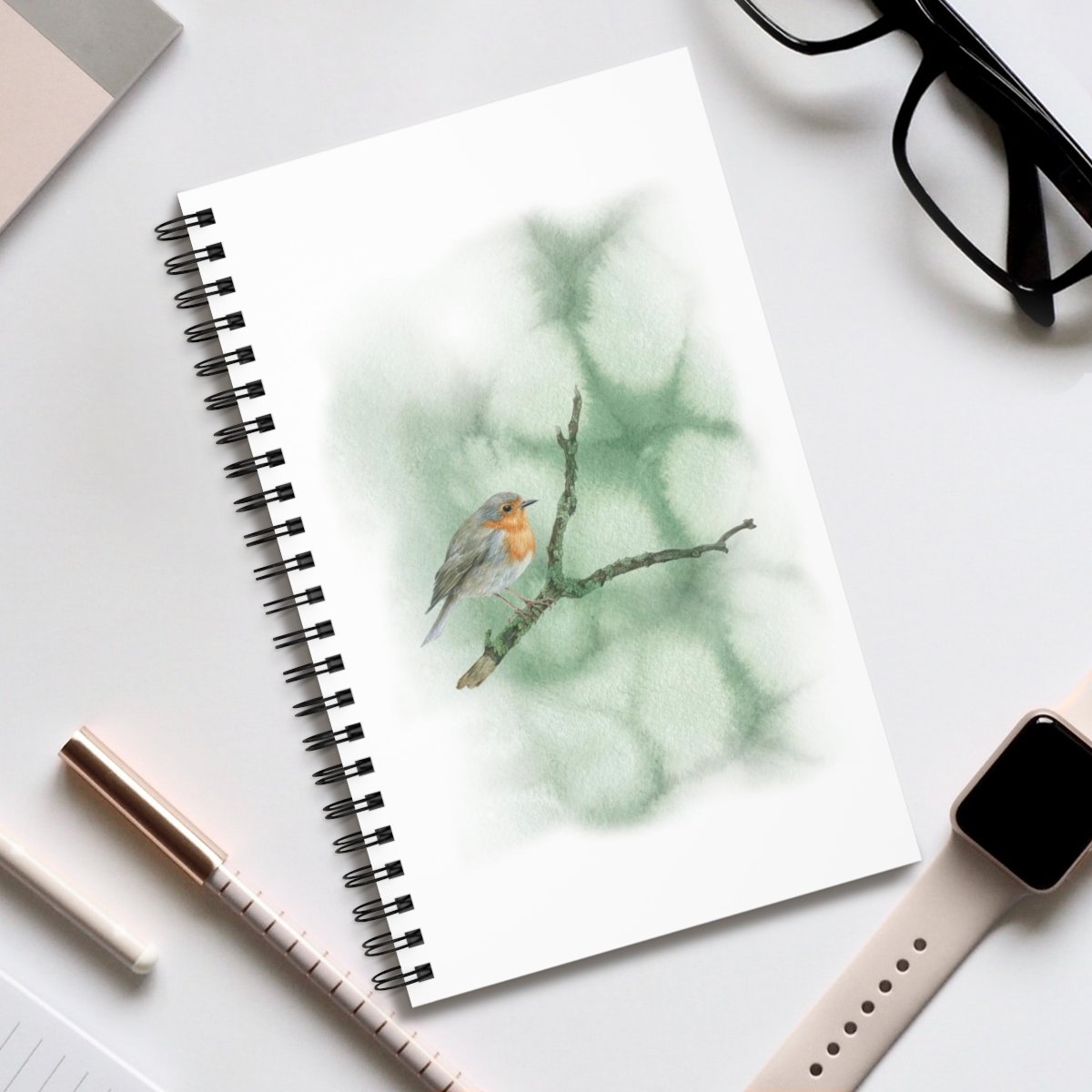 Robin on a branch – Spiral Journal (EU)